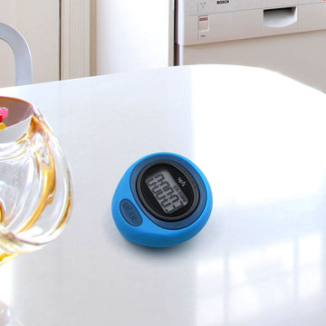 Digital pedometer for tracking steps, calories, distance, speed, and duration during fitness activities.