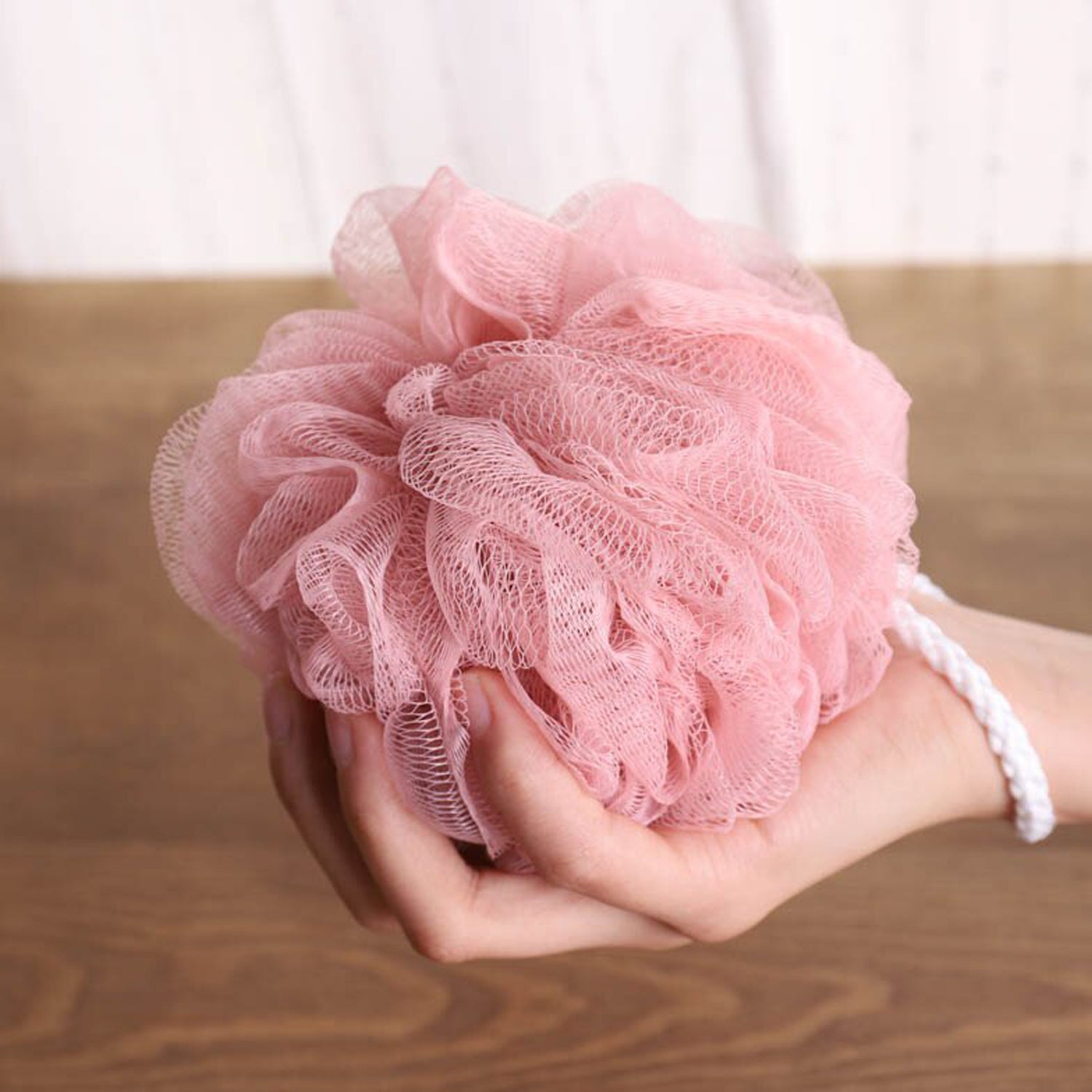 Back scrubber with loofah sponge for body care