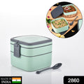 Stackable green bento box with carrying handle